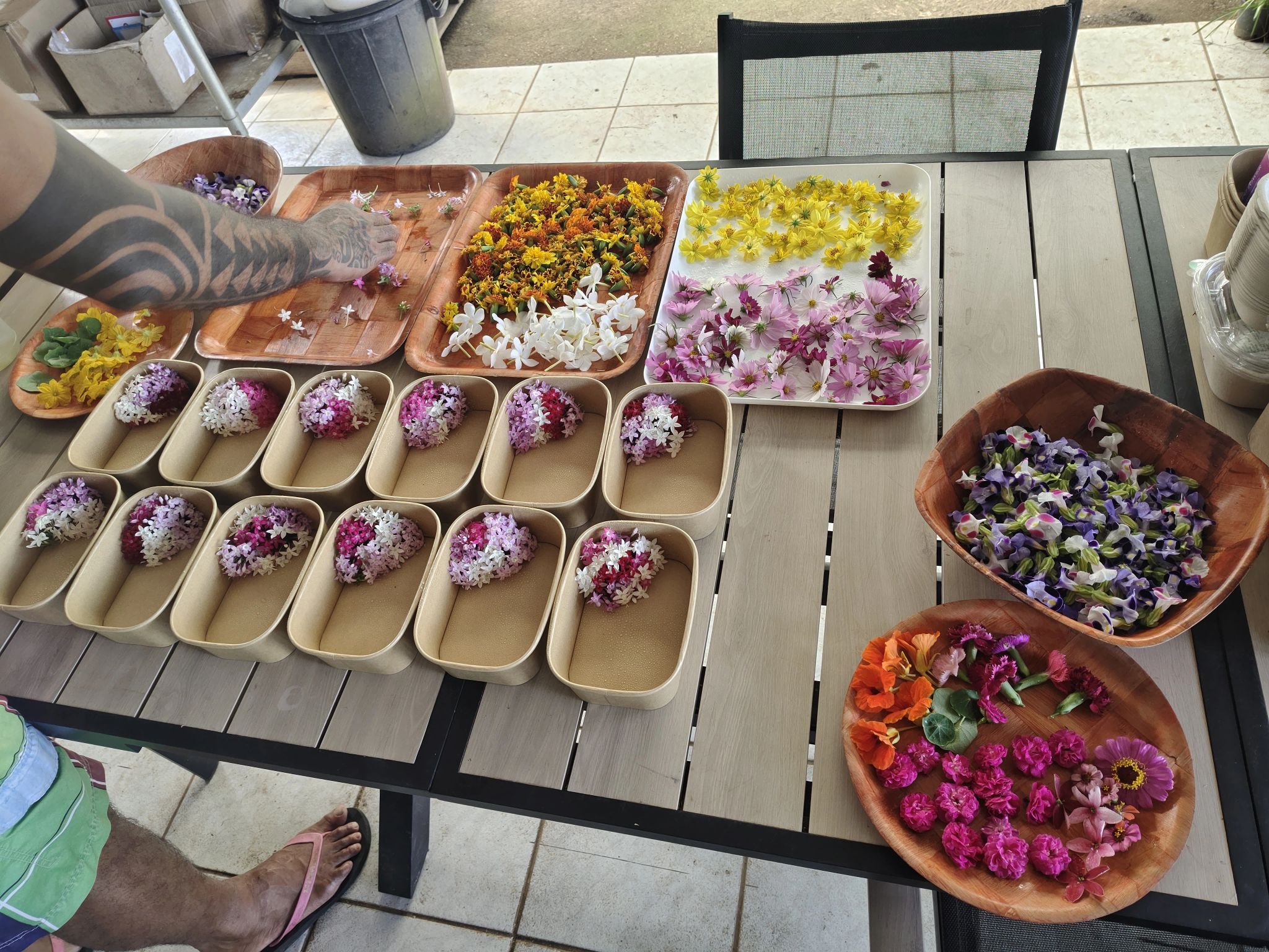 Sorting edible flowers produced at a hydroponic farm in Tahiti